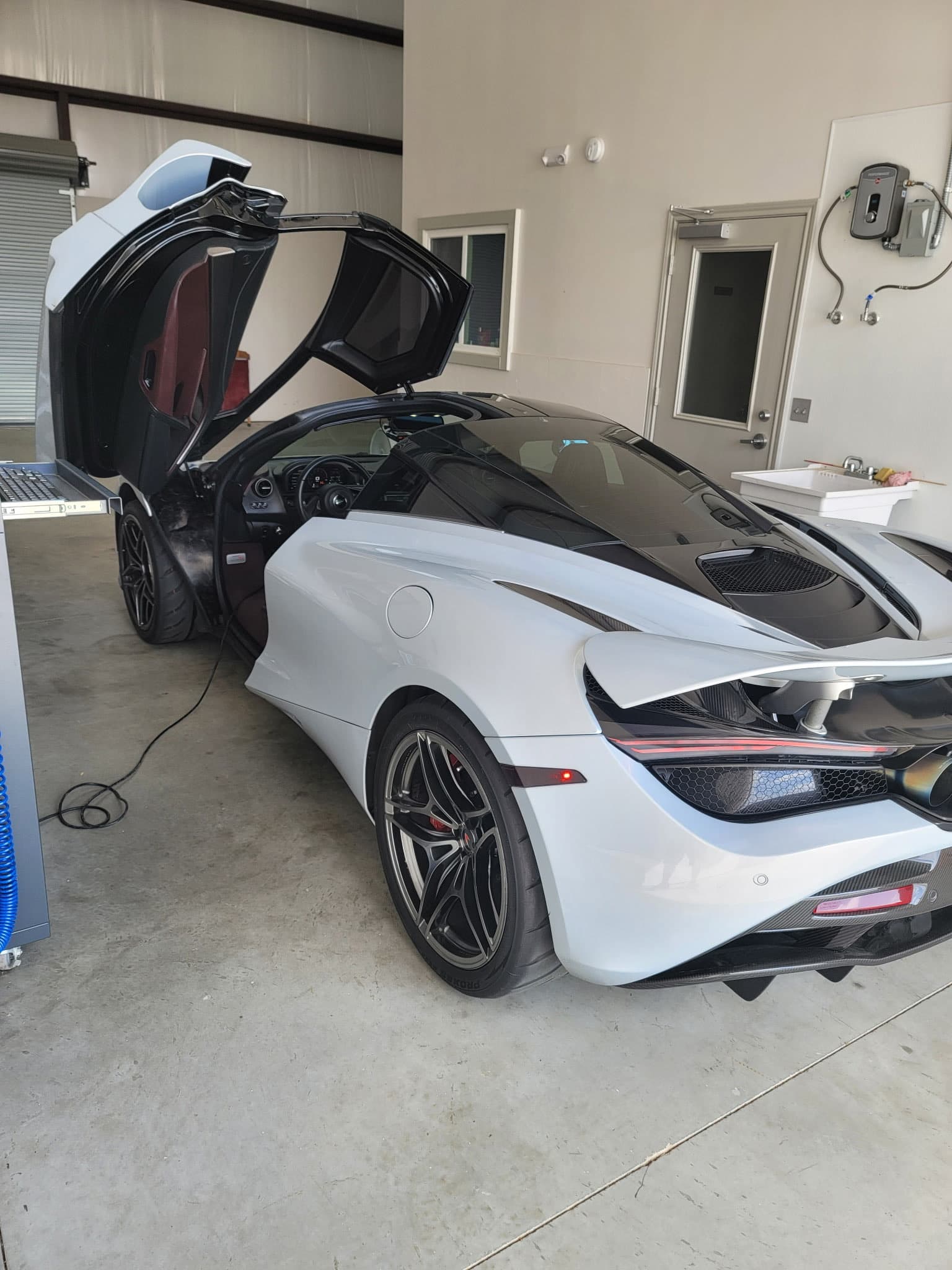 McLaren 720S in the TVI inspection bay in Cypress, TX